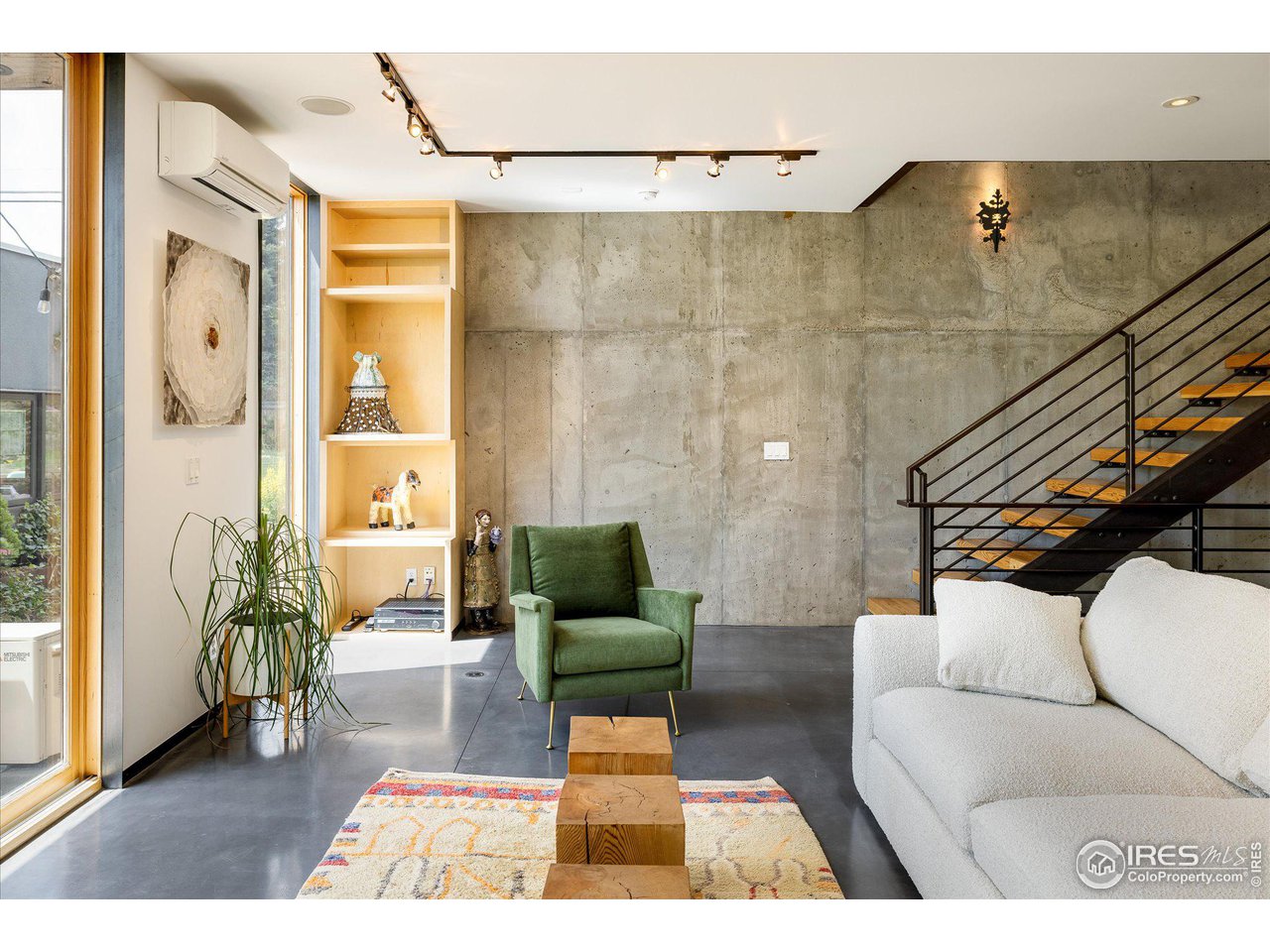 1740 Cedar Avenue Boulder, CO 80304 - Photo 8 of 40 a living room with furniture and a rug