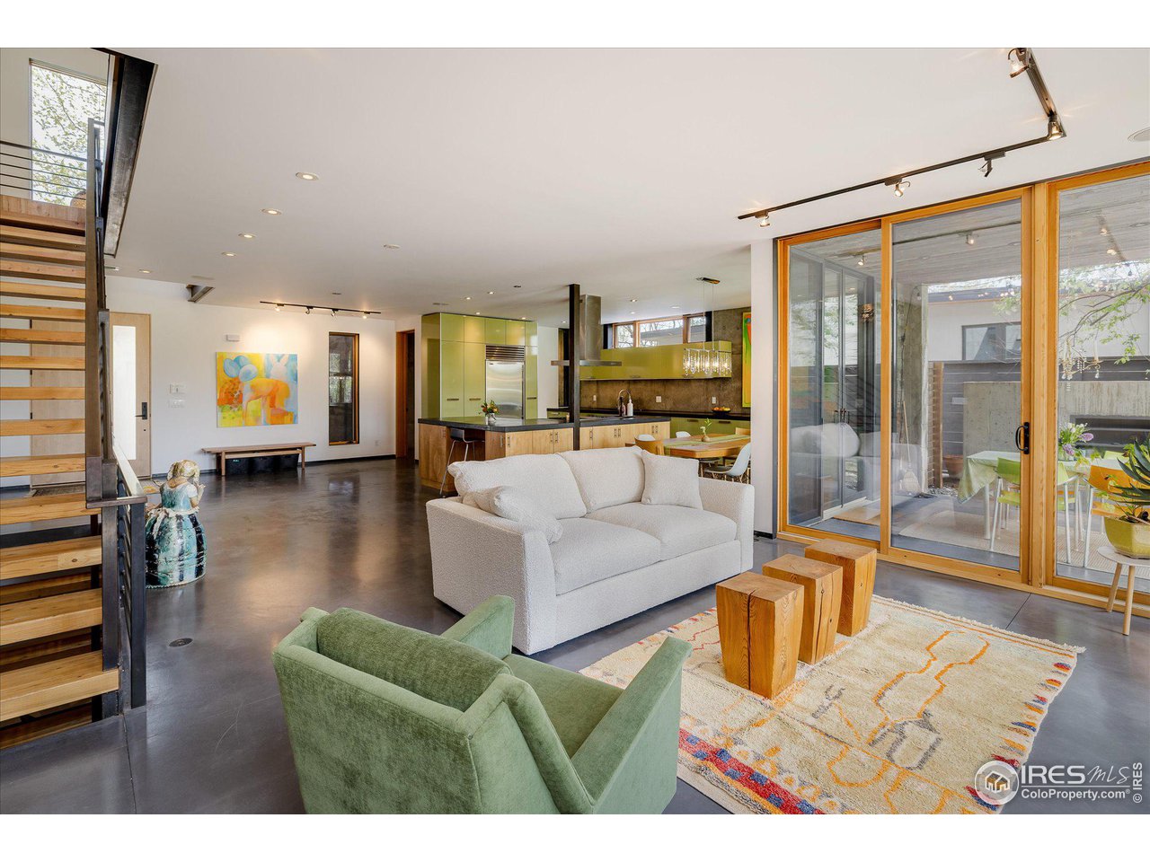 1740 Cedar Avenue Boulder, CO 80304 - Photo 9 of 40 a living room with furniture and a large window