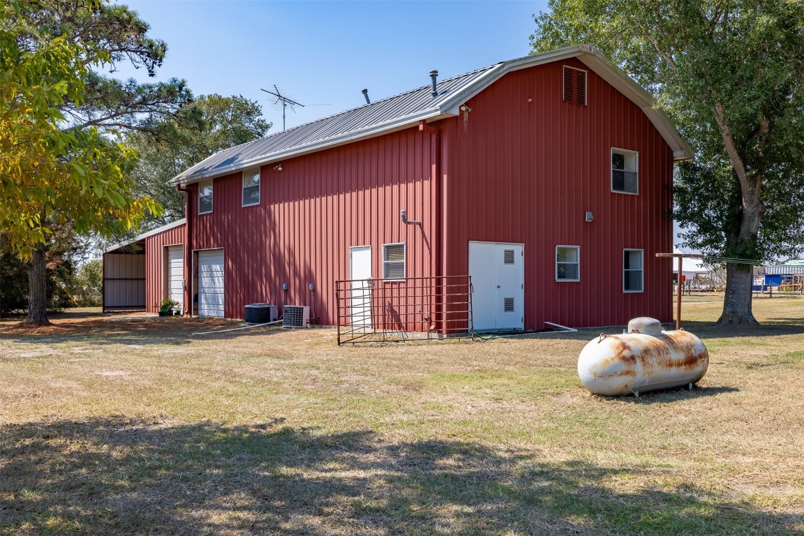 224 Fm 954 Road Round Top, TX 78954 - Photo 5 of 40 a front view of a house with a yard
