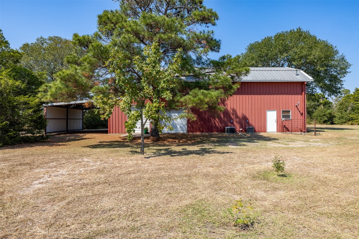 224 Fm 954 Road Round Top, TX 78954 - Photo 6 of 40 a view of a house with a yard