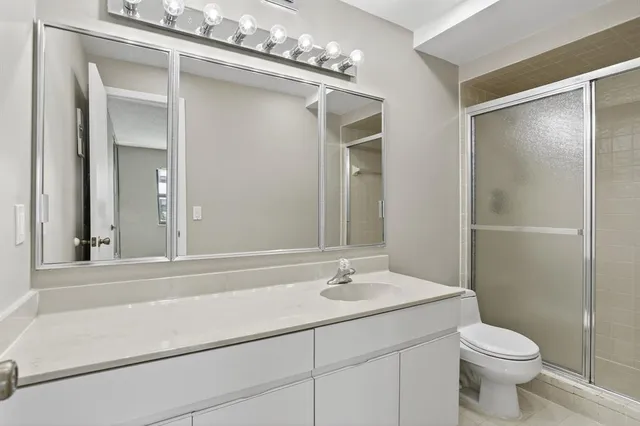 a view of swimming pool with outdoor seating and a couch