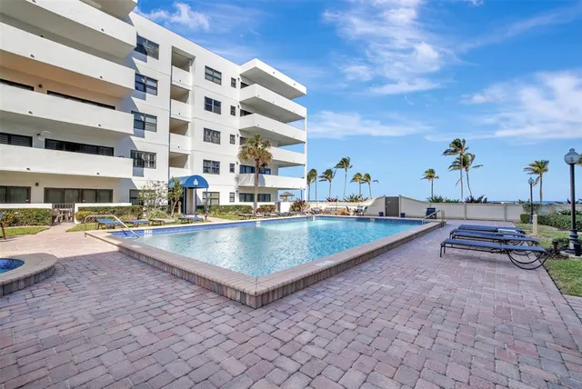 a view of an empty room with glass door