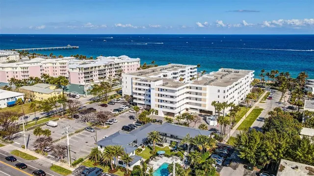 a view of a building with a garden