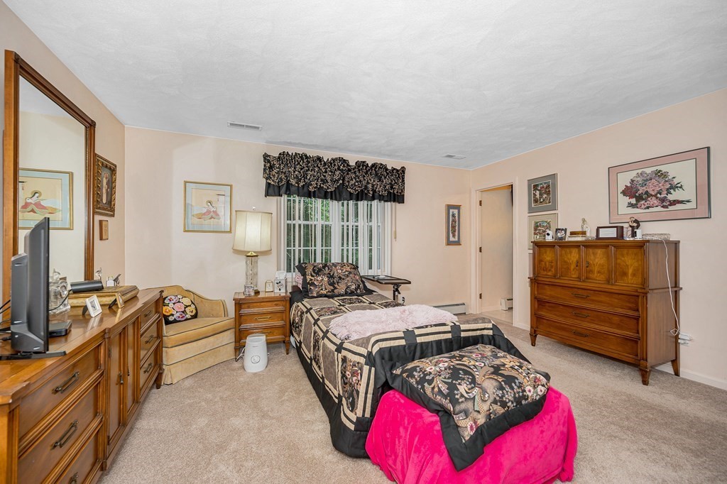 49 Susan Drive Saugus, MA 01906 - Photo 15 of 33 a bedroom with furniture and a window