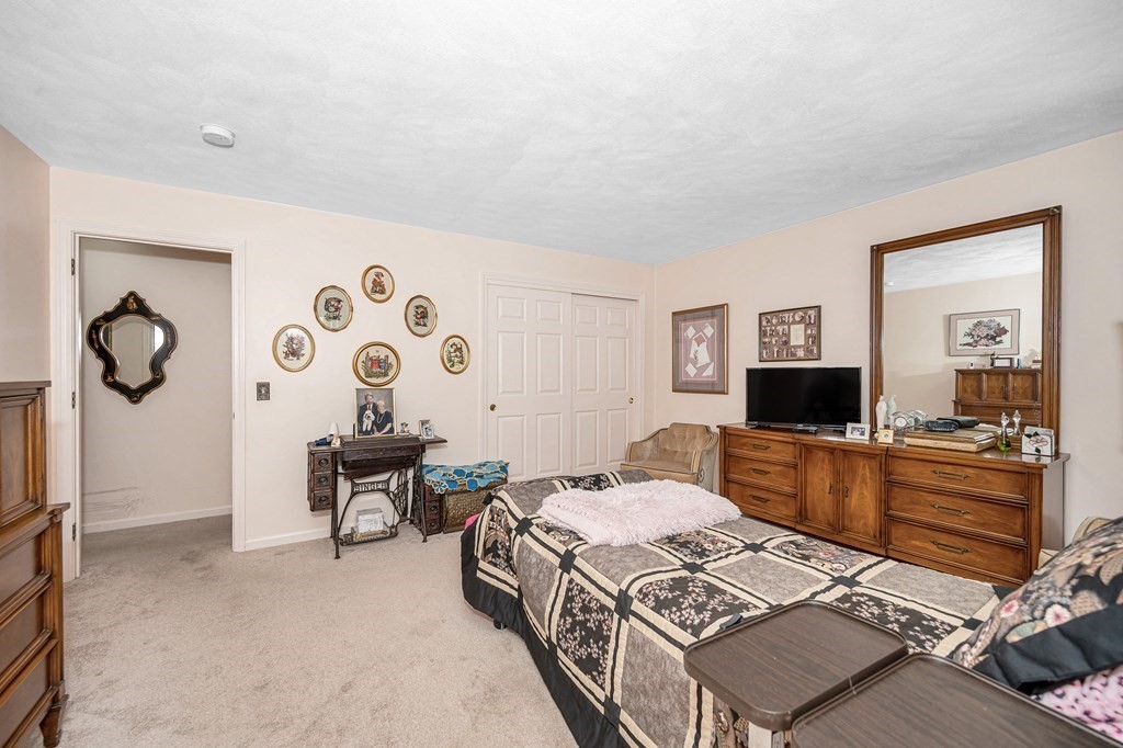 49 Susan Drive Saugus, MA 01906 - Photo 17 of 33 a large bedroom with a bed and furniture