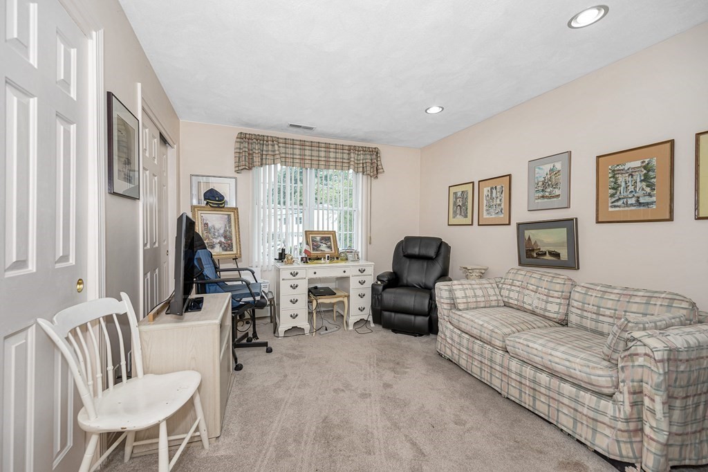 49 Susan Drive Saugus, MA 01906 - Photo 19 of 33 a living room with furniture and a large window