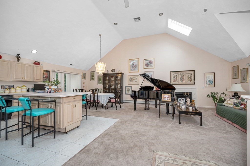 49 Susan Drive Saugus, MA 01906 - Photo 3 of 33 a living room with lots of furniture and kitchen view