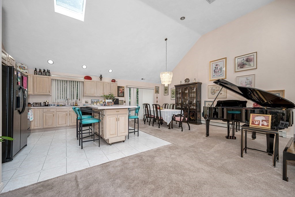49 Susan Drive Saugus, MA 01906 - Photo 4 of 33 a kitchen with a table and chairs in it