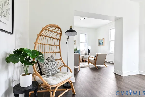 a living room with furniture and a window