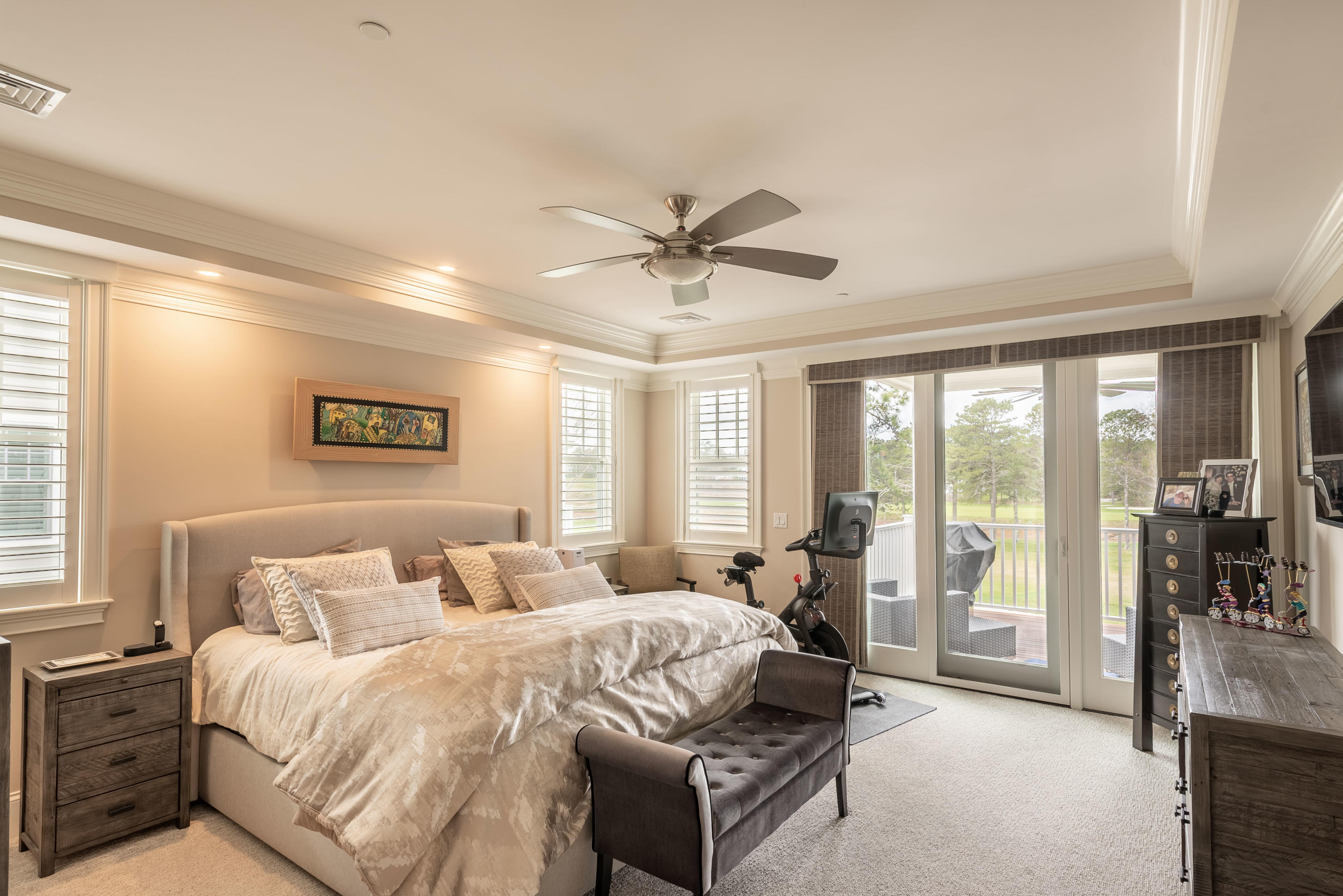 66 Simons Road, Unit C Mashpee, MA 02649 - Photo 7 of 11 a bedroom with bed and glass door