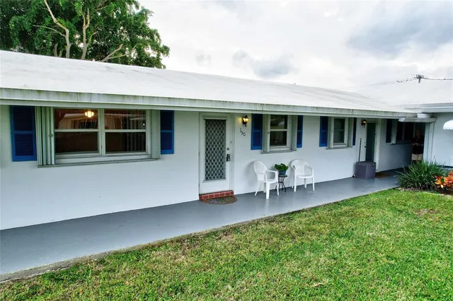 a view of a house with patio