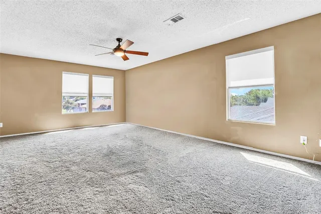 a view of a workspace with furniture