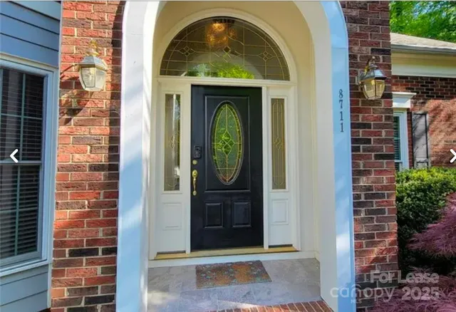 a front view of a house with a entryway