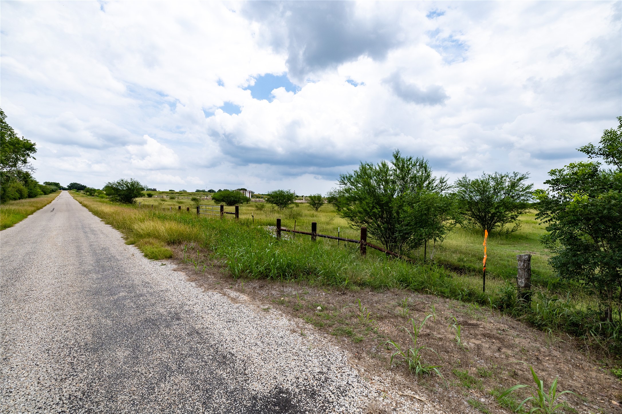 Lot 1 Concrete-Edgar Road Cuero, TX 77954 - Photo 5 of 15 View of dirt / gravel road featuring a rural view