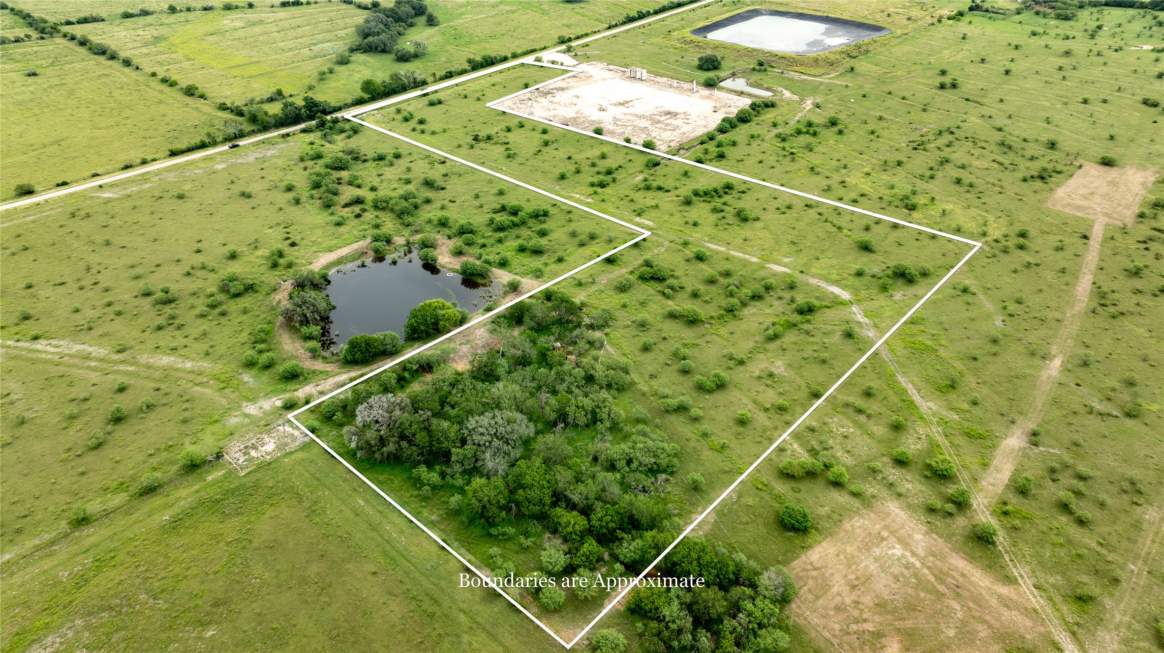 Lot 1 Concrete-Edgar Road Cuero, TX 77954 - Photo 9 of 15 Overview of rural landscape with property parcel outlined