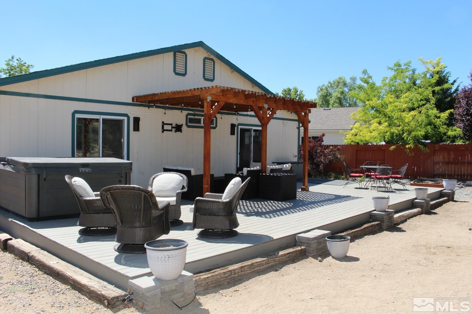 100 Calistoga Court Reno, NV 89508 - Photo 1 of 40 a front view of house with outdoor seating