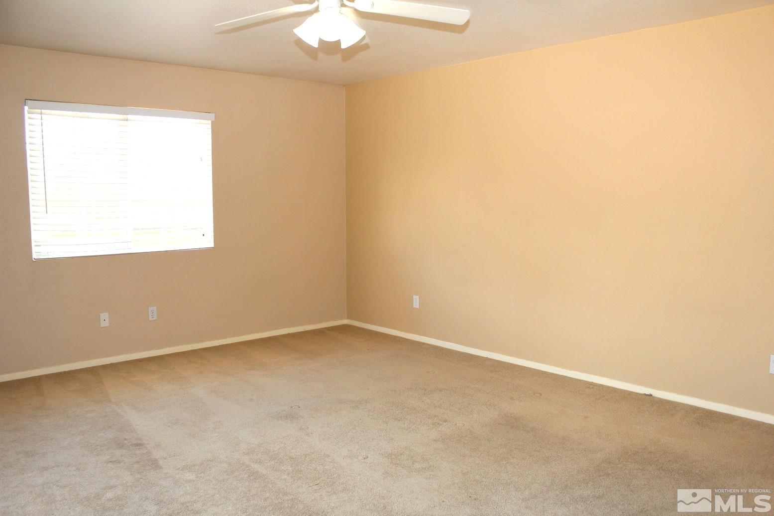 100 Calistoga Court Reno, NV 89508 - Photo 17 of 40 an empty room with a window