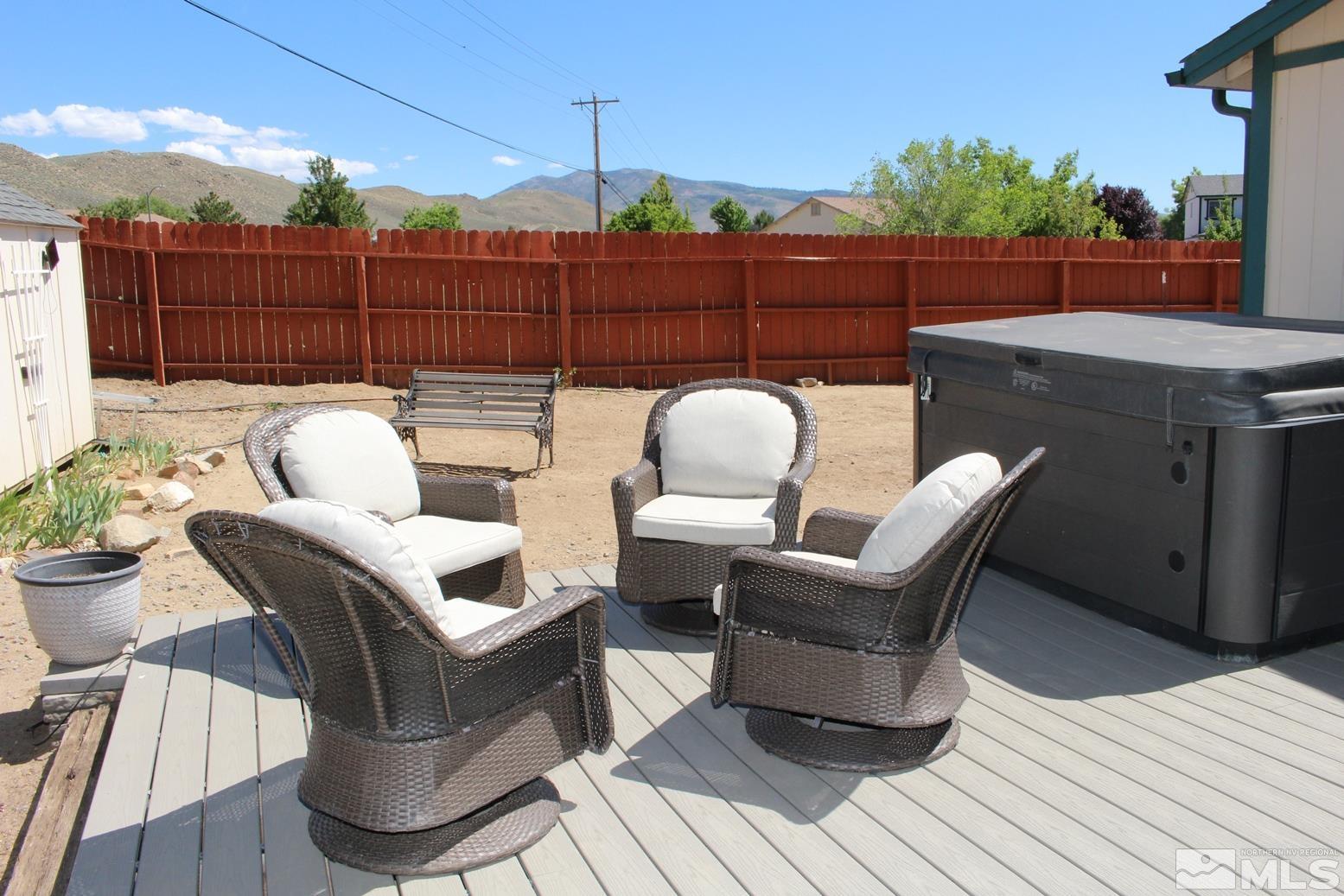 100 Calistoga Court Reno, NV 89508 - Photo 31 of 40 a view of balcony with outdoor seating and wooden floor