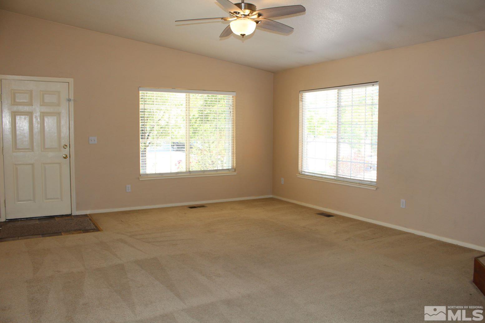 100 Calistoga Court Reno, NV 89508 - Photo 6 of 40 a view of an empty room with a window