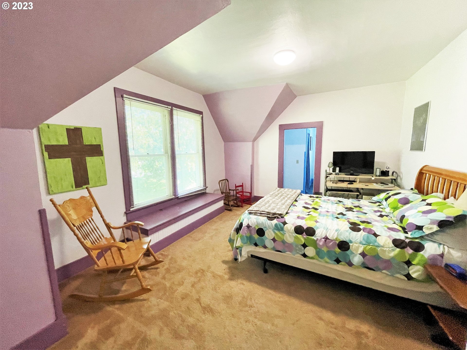 1205 South 1st Street Hermiston, OR 97838 - Photo 16 of 18 a bedroom with a bed and large windows