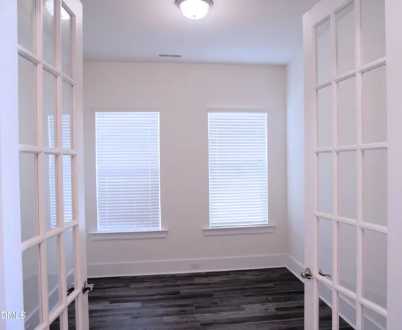 a room with window and stairs