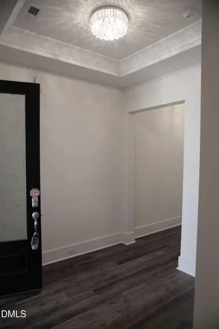 a view of small space with wooden floor