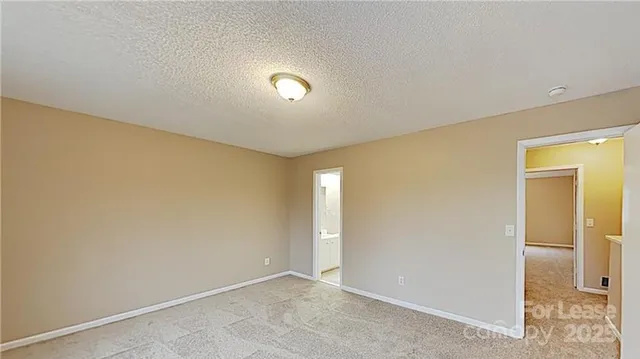 an empty room with entrance and door