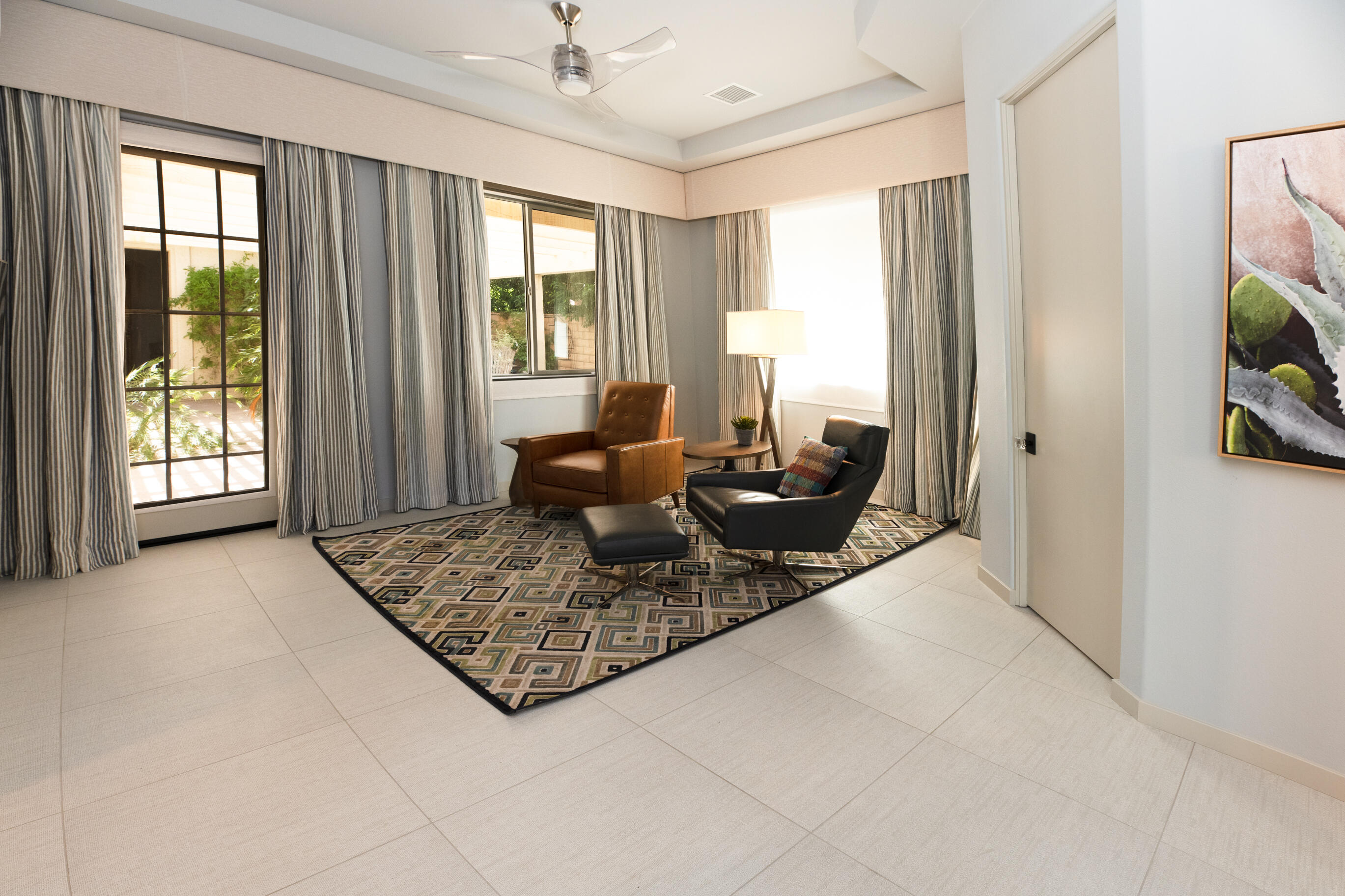12 Varsity Circle Rancho Mirage, CA 92270 - Photo 21 of 70 a living room with furniture and a window