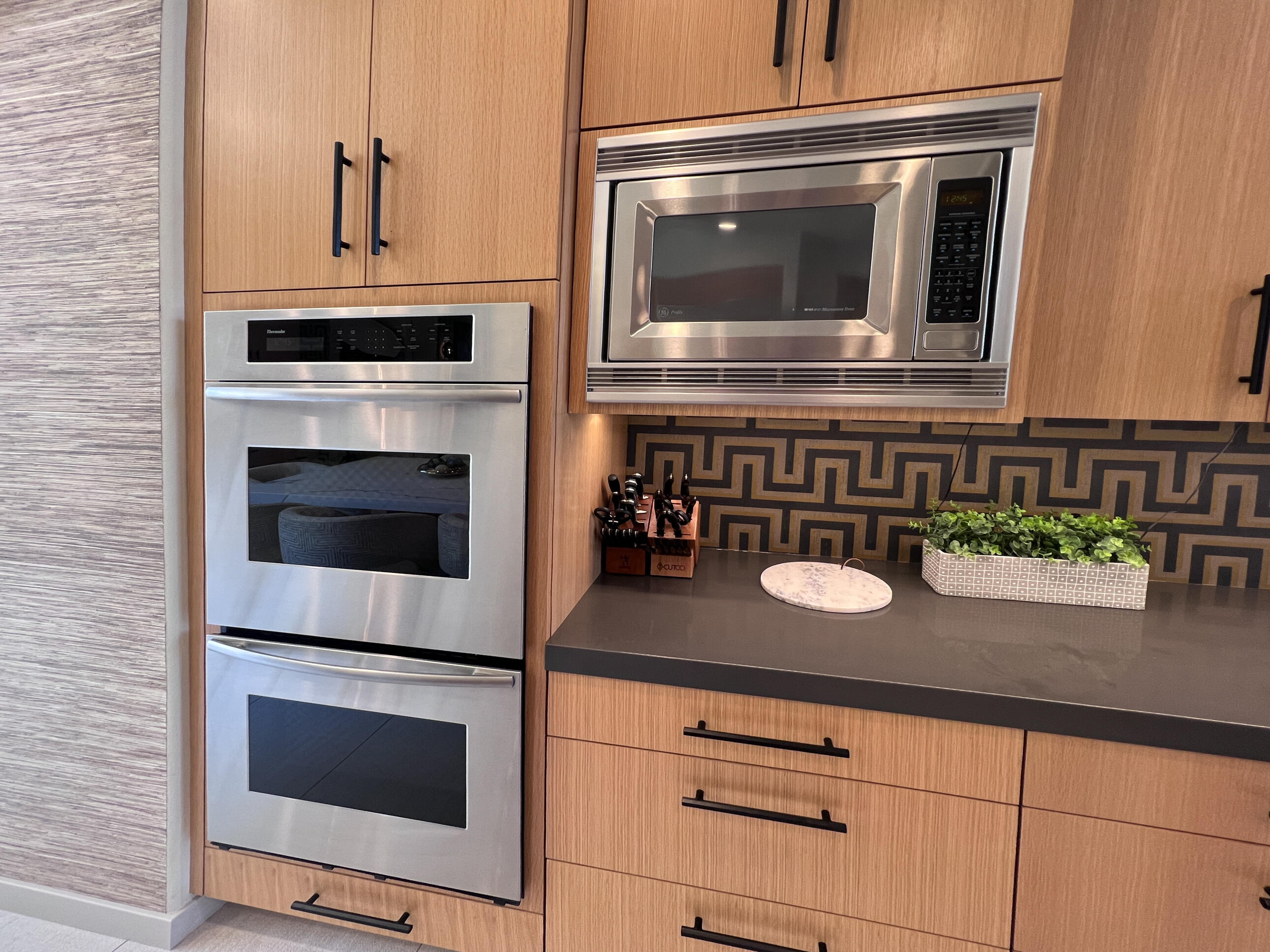 12 Varsity Circle Rancho Mirage, CA 92270 - Photo 43 of 70 a kitchen with a stove and microwave