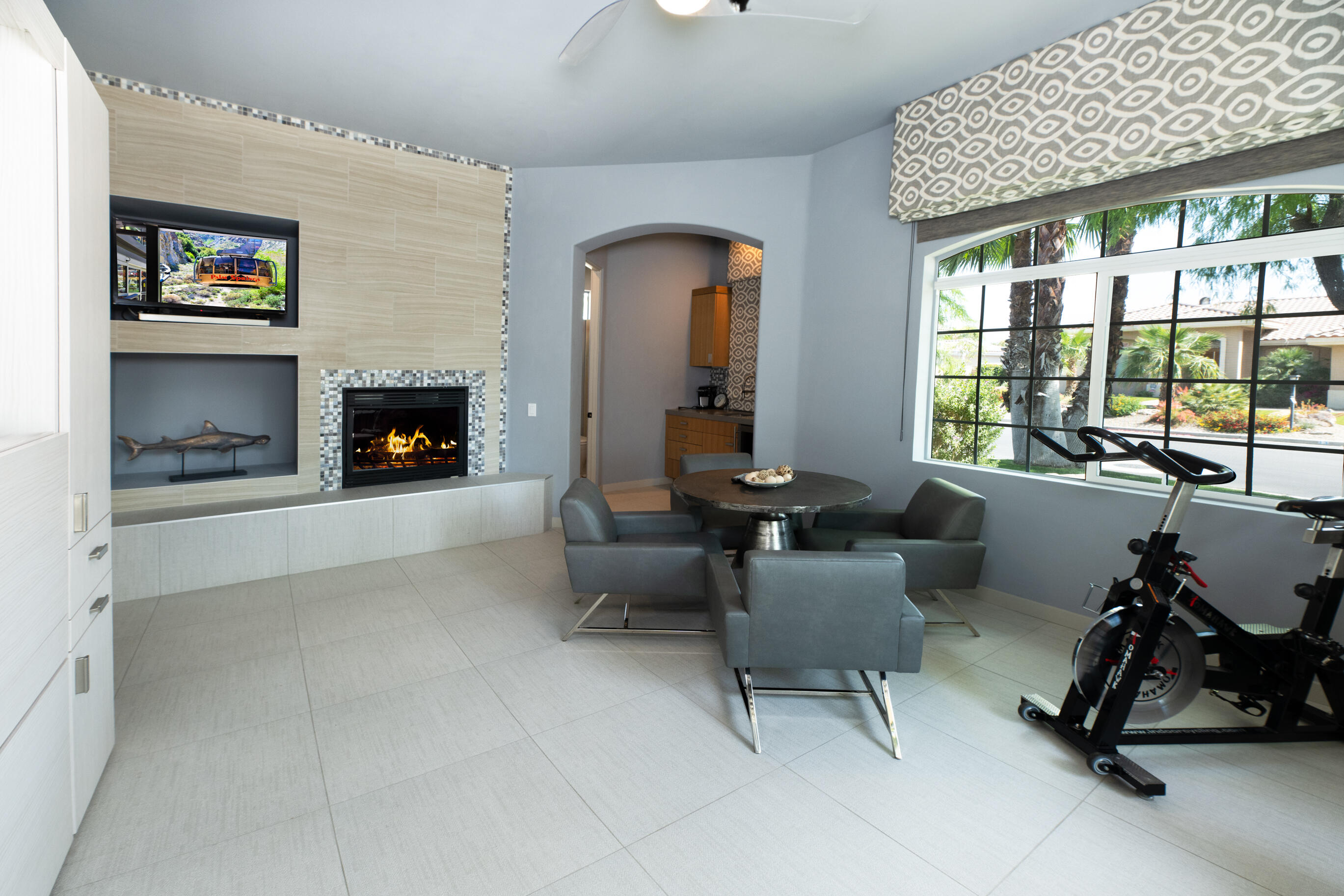 12 Varsity Circle Rancho Mirage, CA 92270 - Photo 54 of 70 a living room with furniture and a fireplace