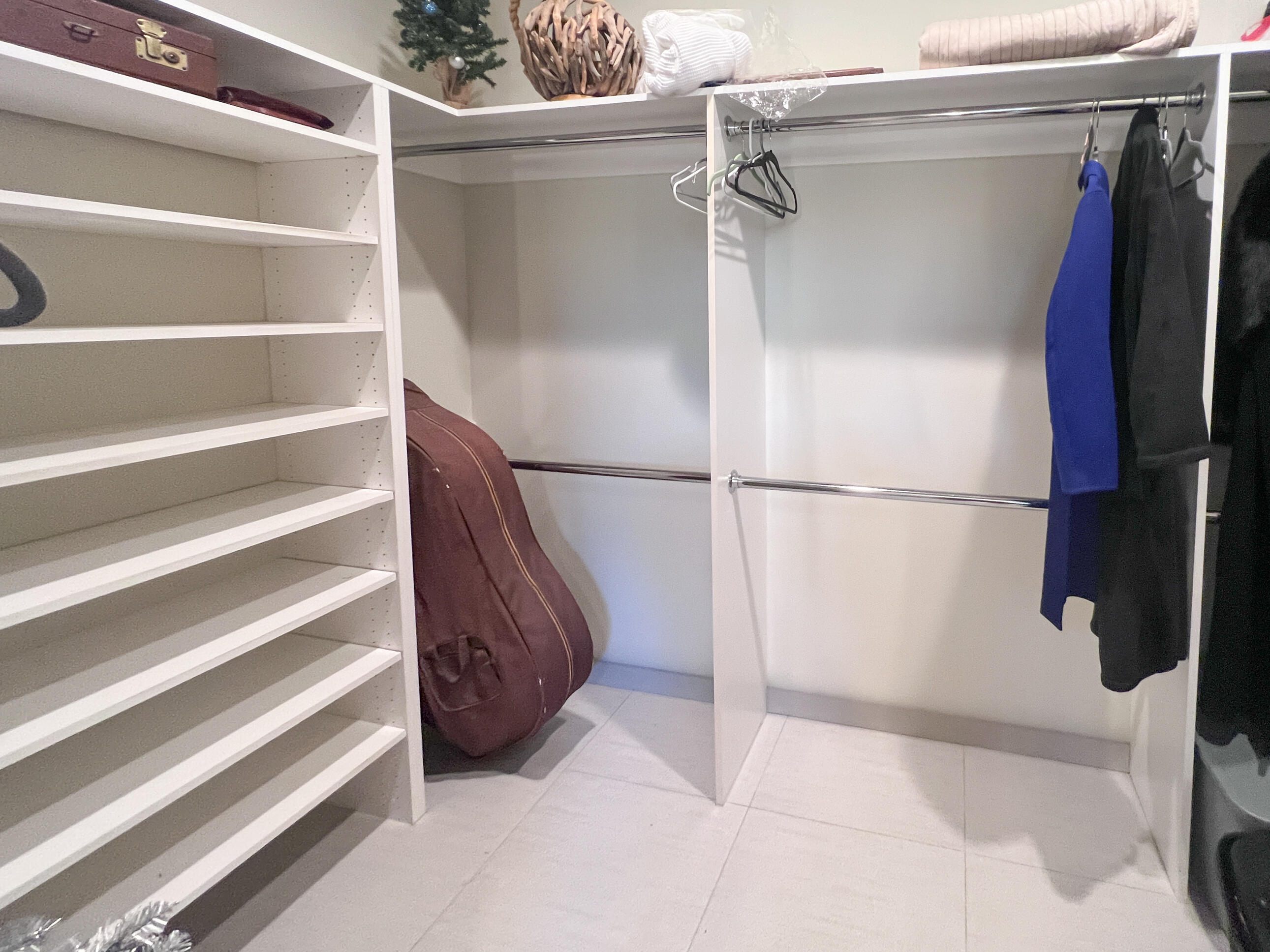 12 Varsity Circle Rancho Mirage, CA 92270 - Photo 60 of 70 a view of walk in closet with empty racks