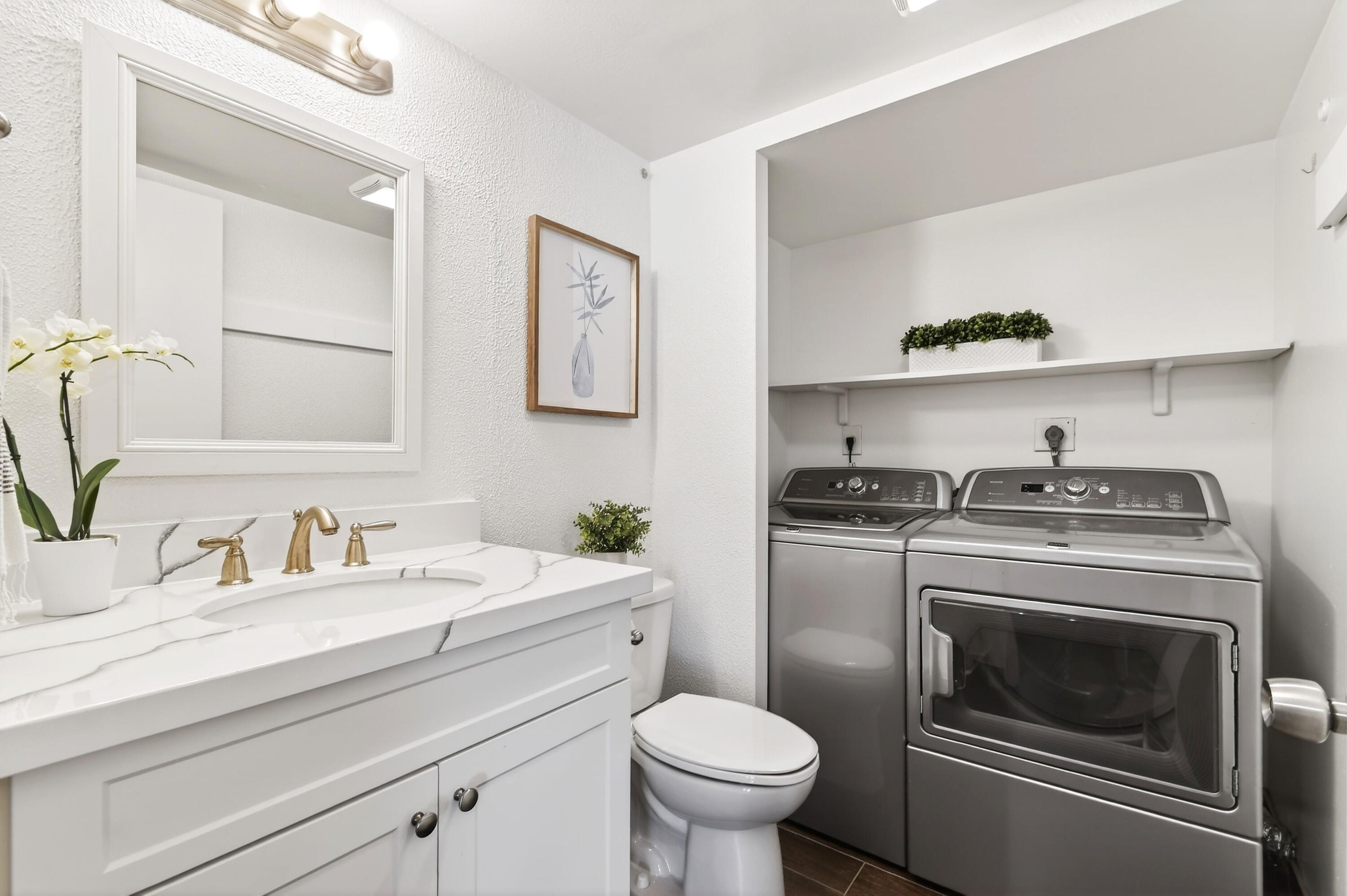 3900 County Line Road, Unit 15A Tequesta, FL 33469 - Photo 18 of 37 a bathroom with a sink stove and cabinets