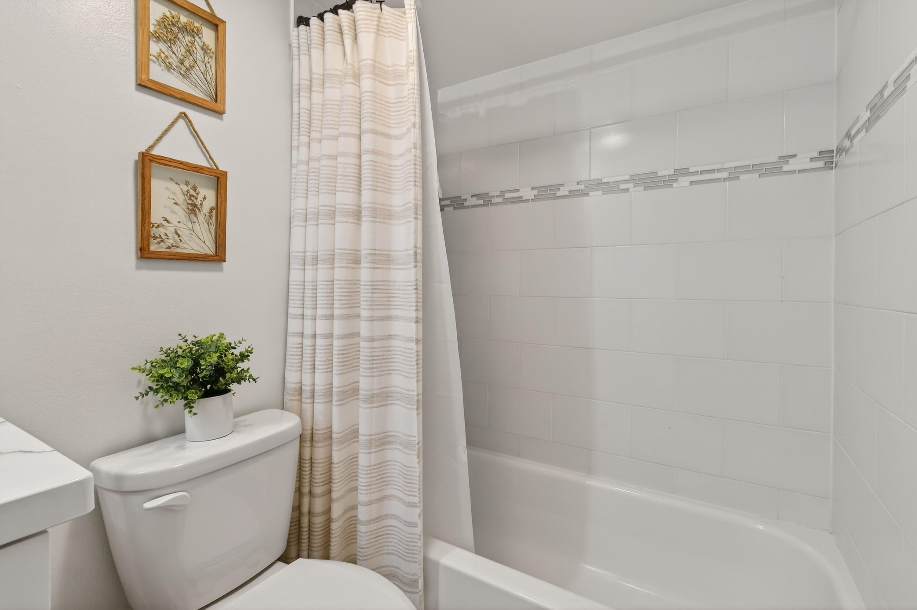 3900 County Line Road, Unit 15A Tequesta, FL 33469 - Photo 32 of 37 a bathroom with a toilet and a shower