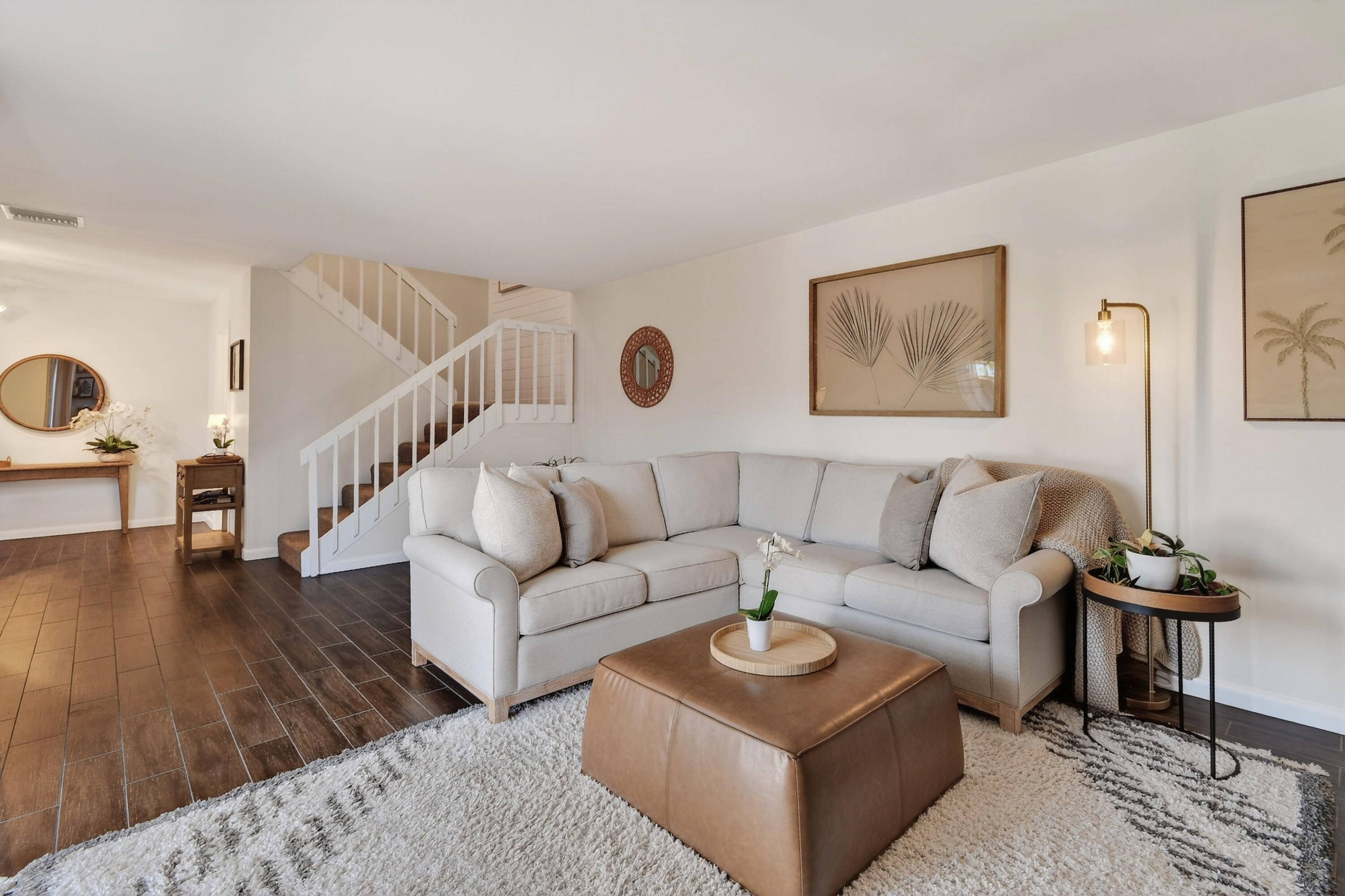 3900 County Line Road, Unit 15A Tequesta, FL 33469 - Photo 6 of 37 a living room with furniture and wooden floor