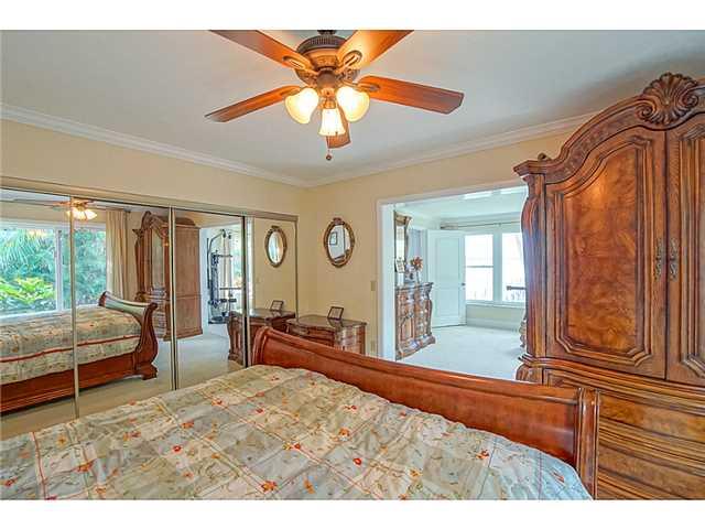 1041 Southeast Riverside Drive Stuart, FL 34996 - Photo 14 of 25 a living room with furniture and a large window