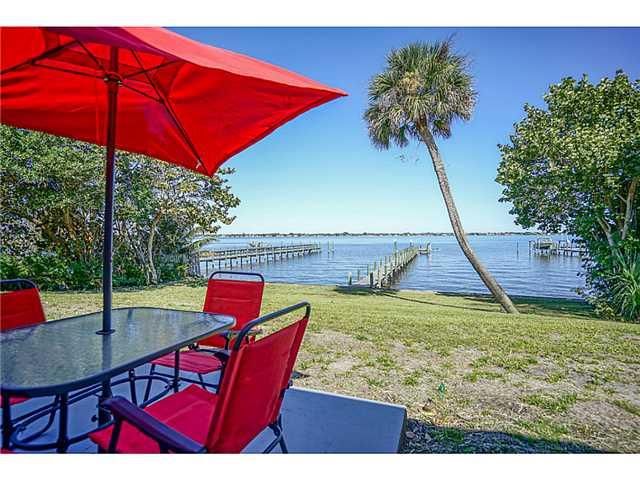 1041 Southeast Riverside Drive Stuart, FL 34996 - Photo 25 of 25 a view of an outdoor sitting area with furniture