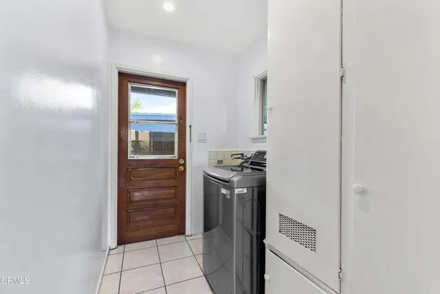 a view of a kitchen from the hallway