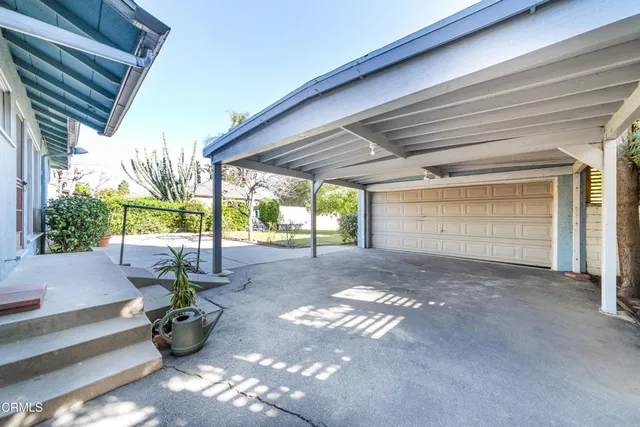 a view of a backyard with garden