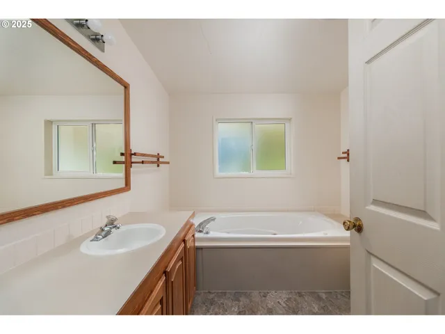 a bathroom with a bathtub