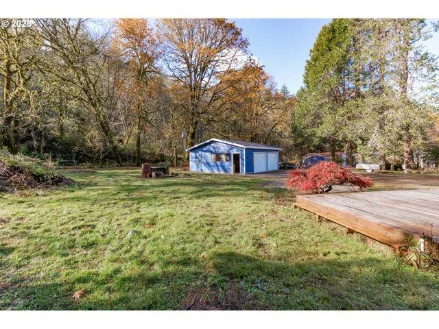 a childrens park with lots of trees