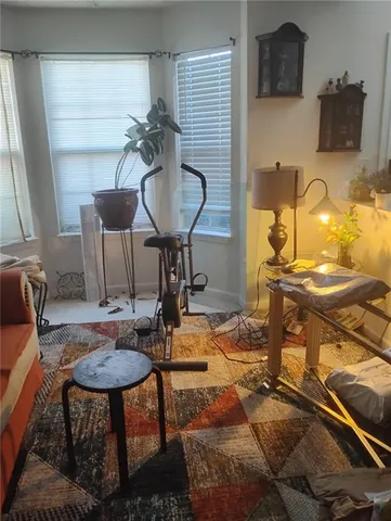 a view of a workspace with furniture