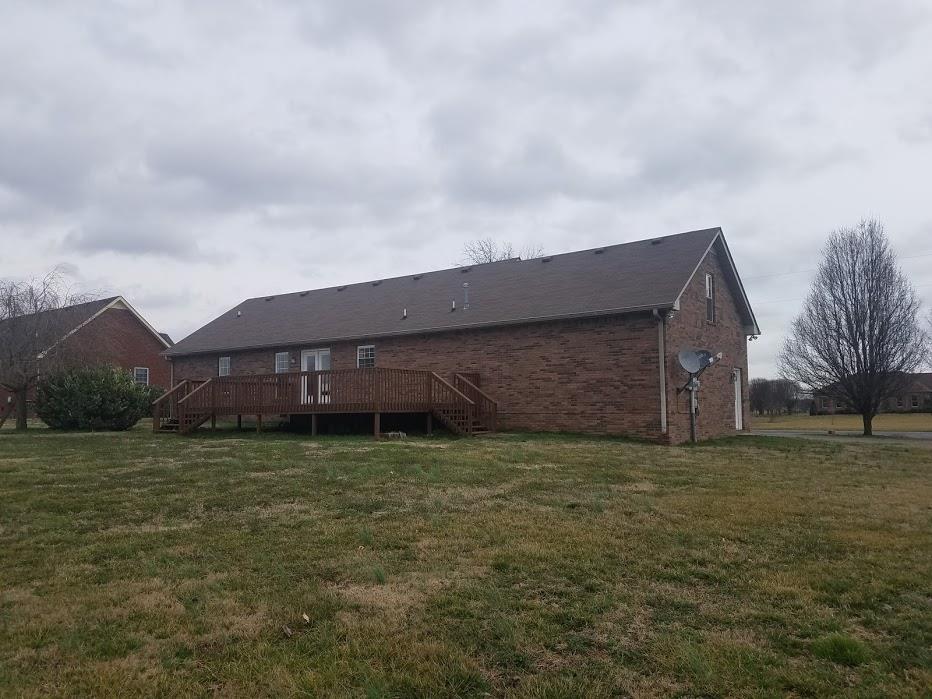 4686 Matthews Road Cedar Hill, TN 37032 - Photo 18 of 20 a house view with a garden