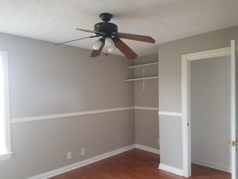 4686 Matthews Road Cedar Hill, TN 37032 - Photo 9 of 20 a view of an empty room with wooden floor