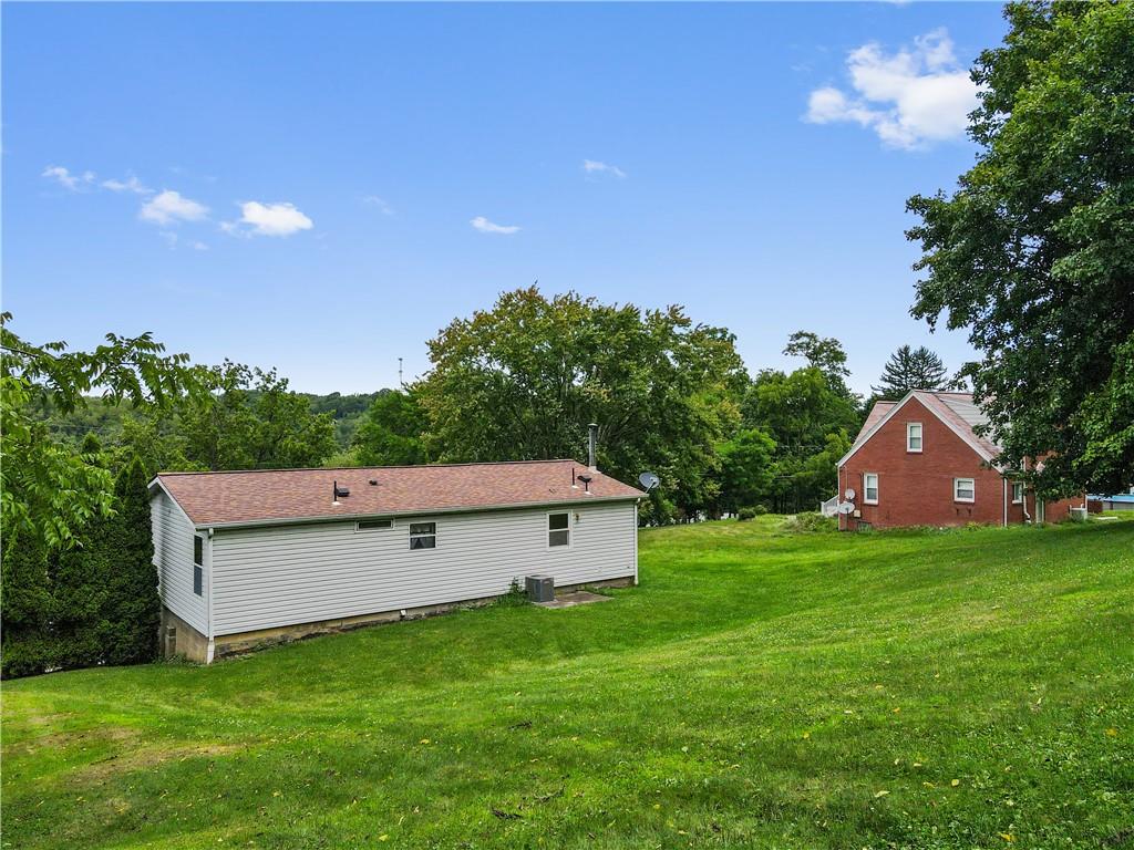 14 Belgium Hill Road Cecil, PA 15321 - Photo 14 of 16 a view of a house with a big yard