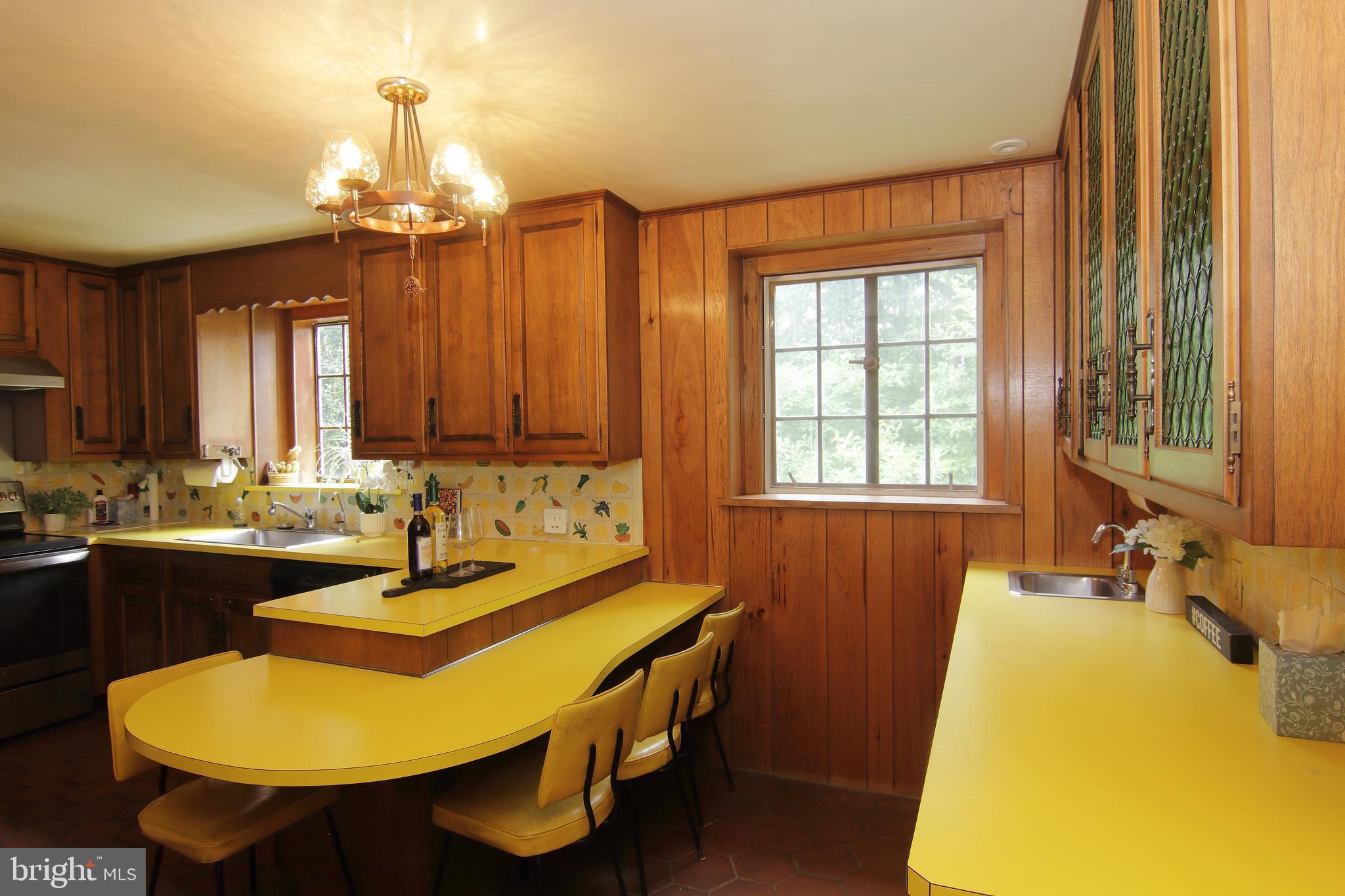 409 Marple Road Broomall, PA 19008 - Photo 14 of 37 a bathroom with a tub sink and mirror