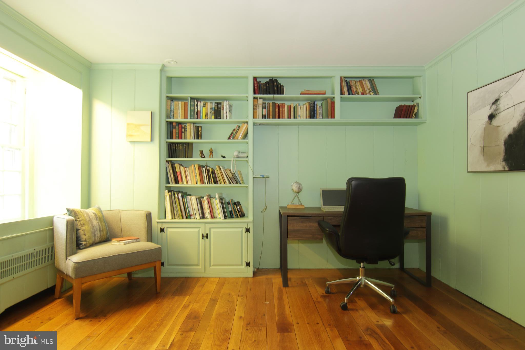 409 Marple Road Broomall, PA 19008 - Photo 17 of 37 a work room with furniture and a book shelf