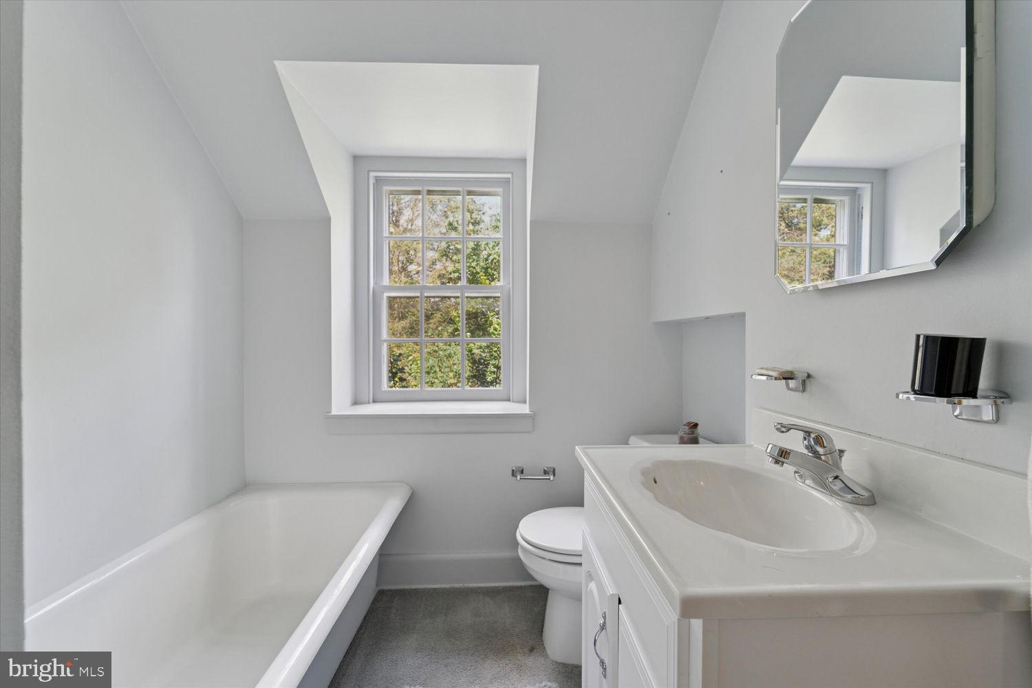 409 Marple Road Broomall, PA 19008 - Photo 27 of 37 a bathroom with a sink and a bathtub