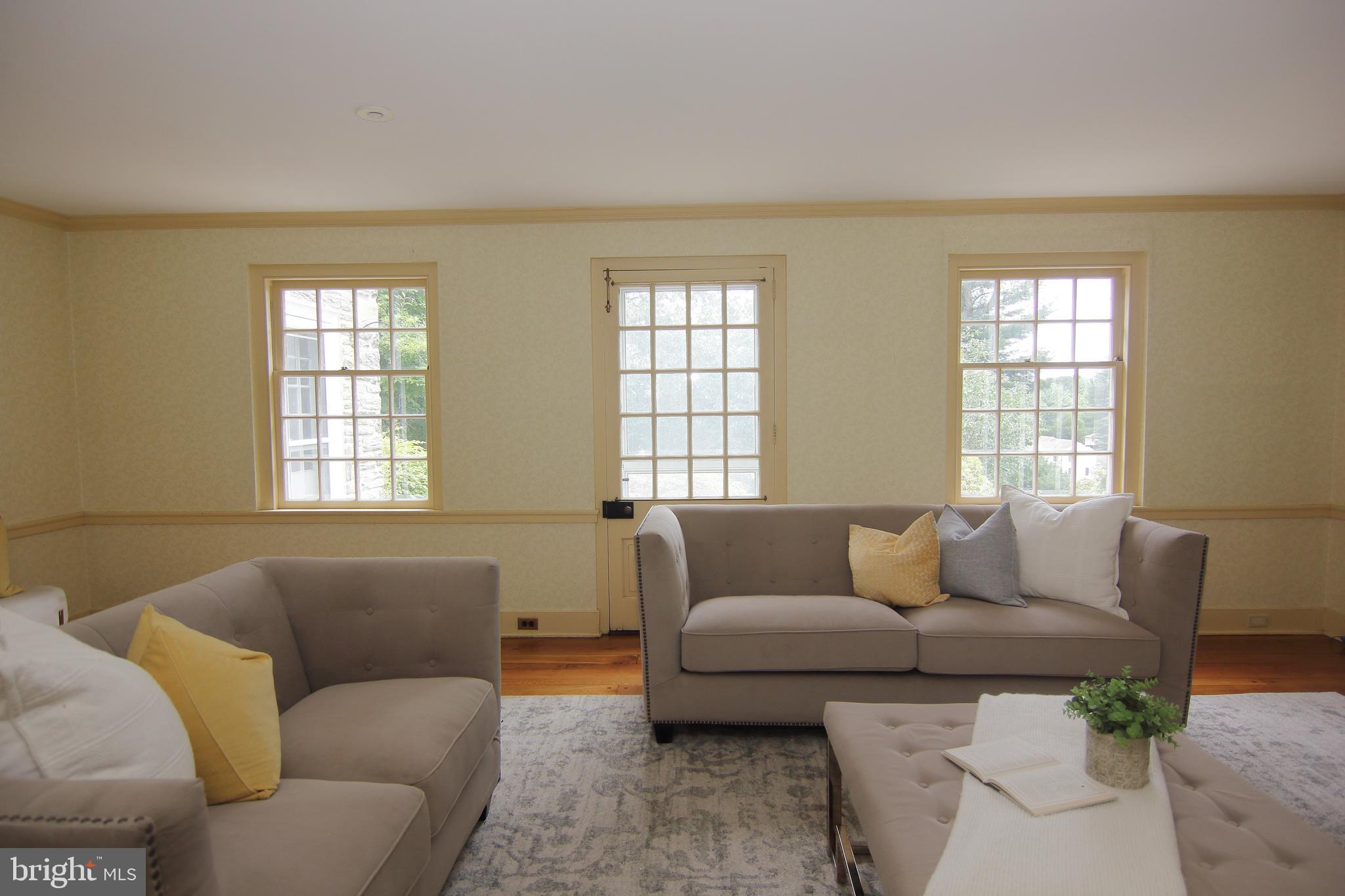 409 Marple Road Broomall, PA 19008 - Photo 8 of 37 a living room with furniture and windows
