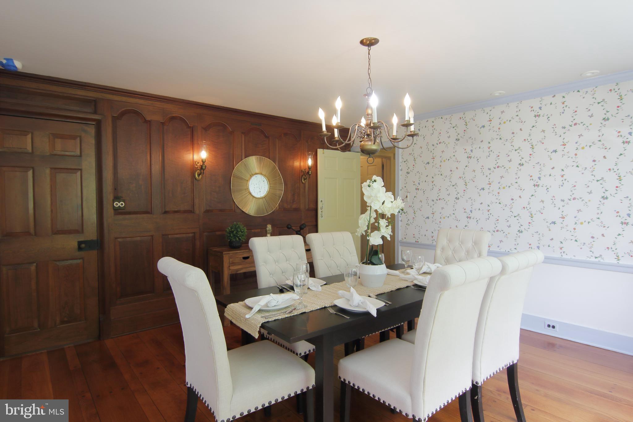 409 Marple Road Broomall, PA 19008 - Photo 9 of 37 a view of a dining room with furniture and wooden floor