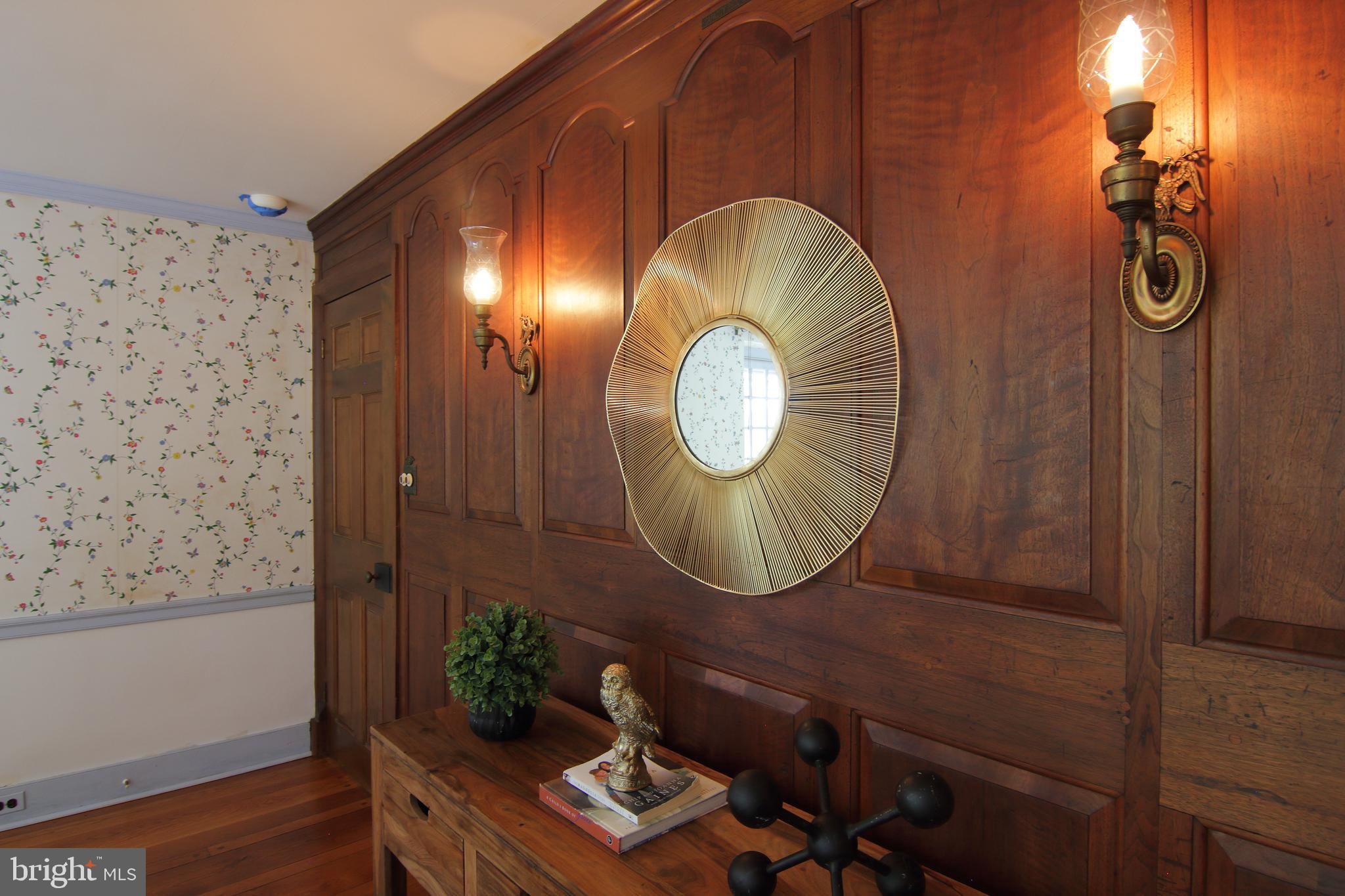 409 Marple Road Broomall, PA 19008 - Photo 10 of 37 a front view of a house with garden space and wooden floor